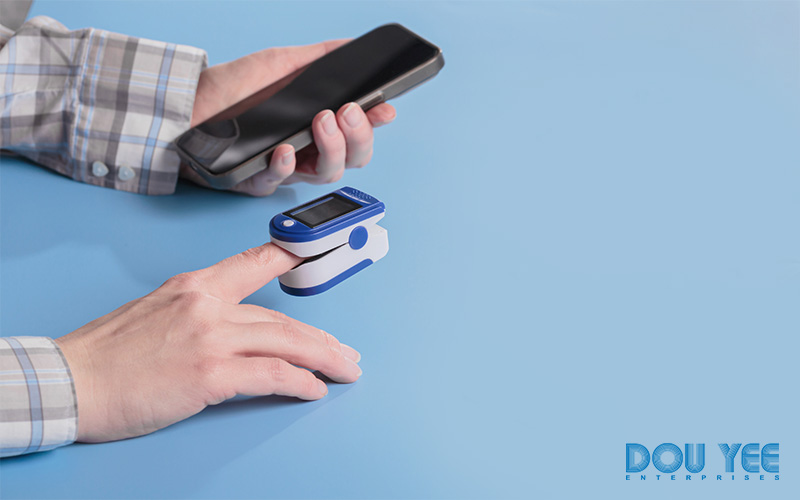 Person using a pulse oximeter